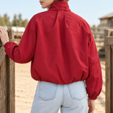 Rood Bomberjack met strikdetail