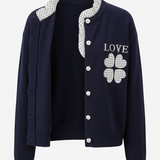 Donkerblauw vest met LOVE-borduursel en stippen – dames